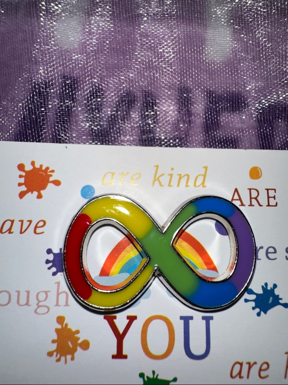 Rainbow Infinity Enamel Pin with Positive Affirmation Card in a sheer bag
